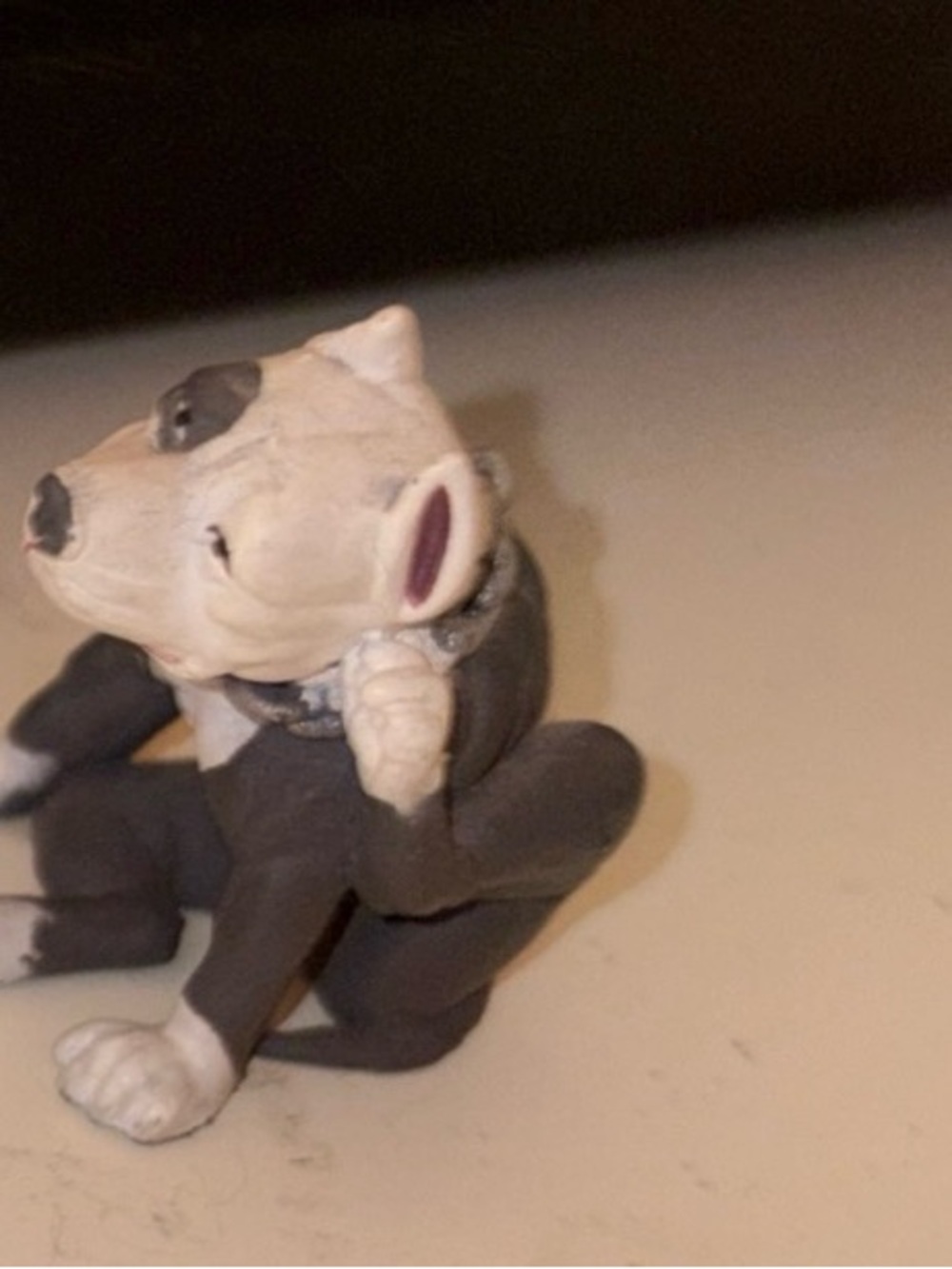 Gray and White Dog Figurine Statue. Miniature 2 inches approx. plastic.